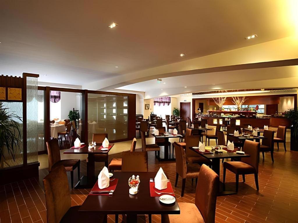 Grand Mercure Teda Dalian Bagian luar foto